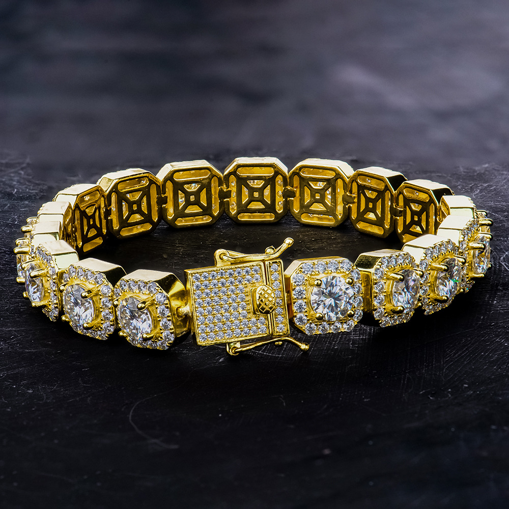 Overhead flat lay view of the bold gold moissanite tennis bracelet, showcasing its full length