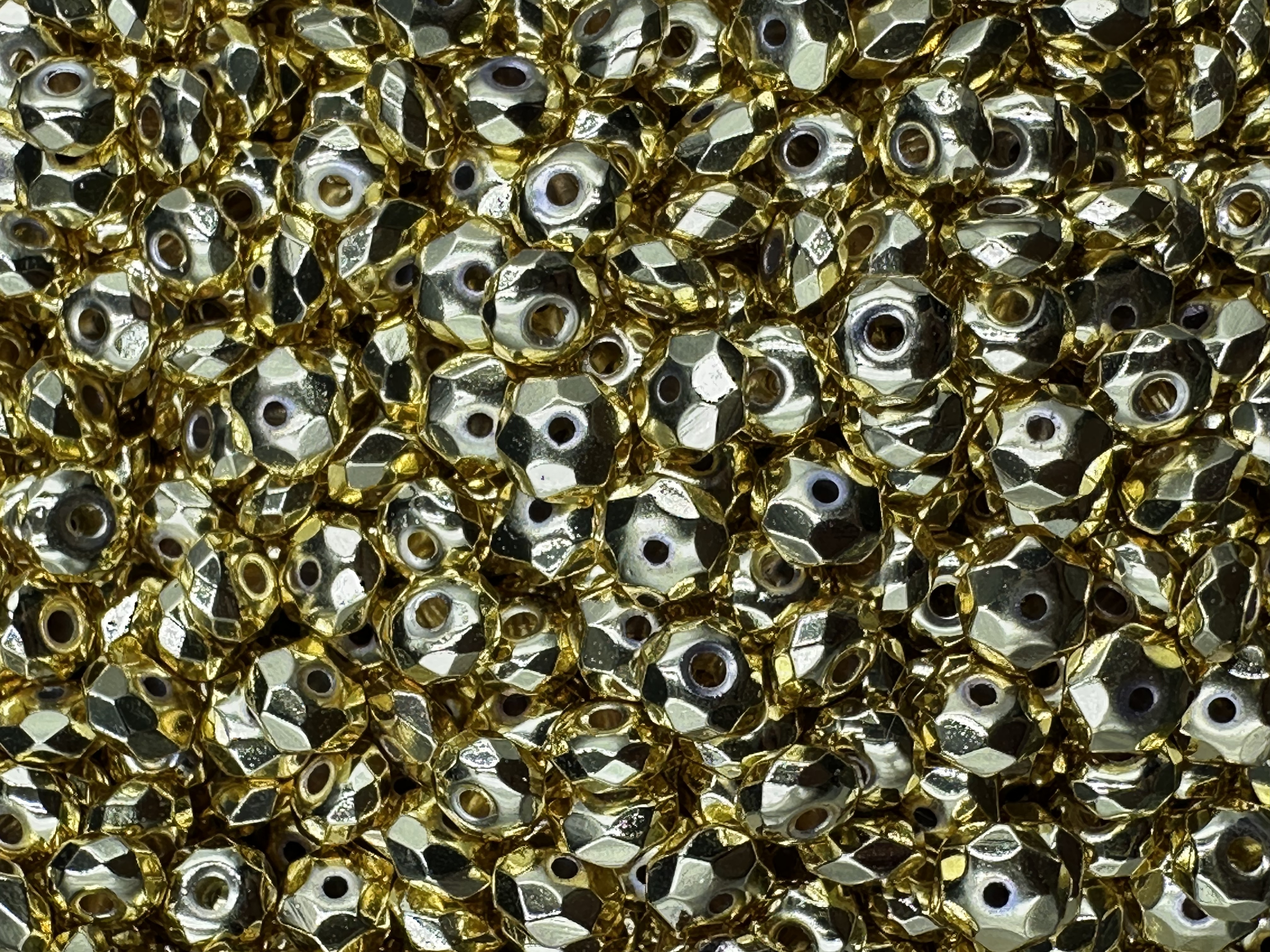 40.Golden Hematite Donut Faceted Shape