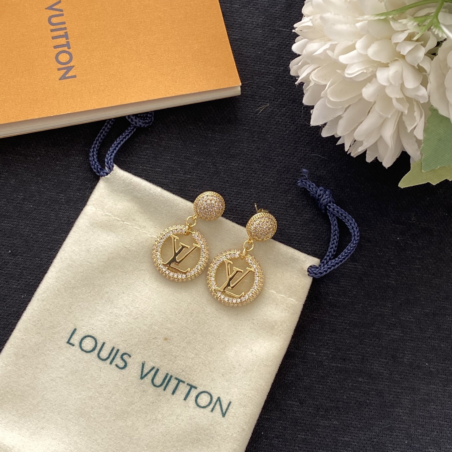 Classic diamond-encrusted round letter earrings