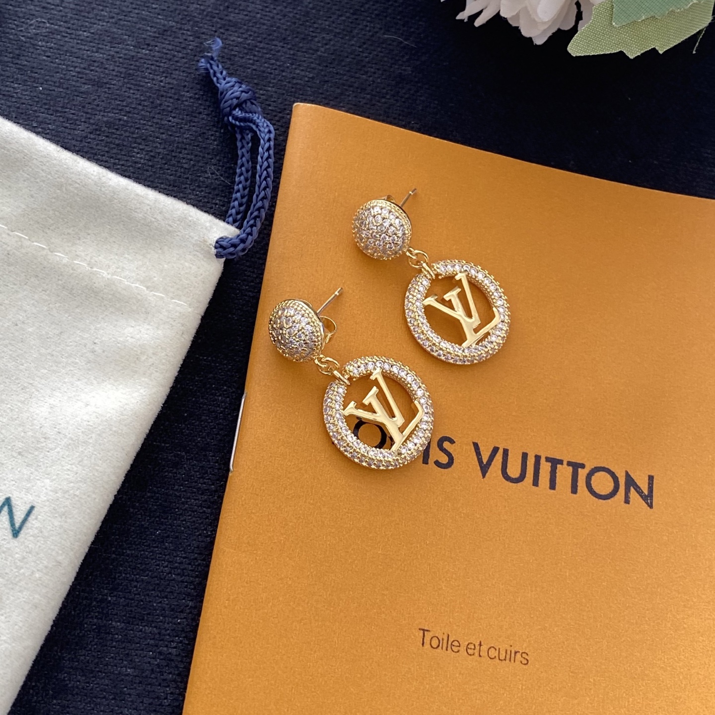 Classic diamond-encrusted round letter earrings