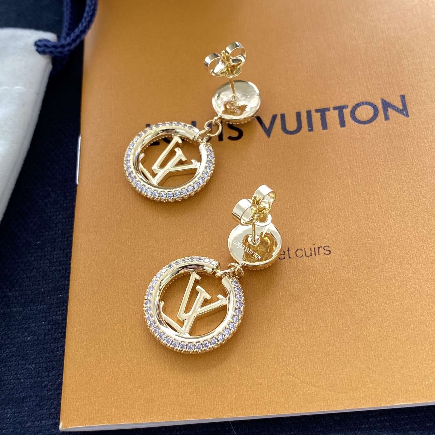 Classic diamond-encrusted round letter earrings