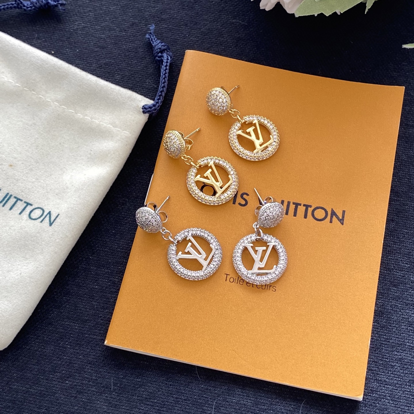 Classic diamond-encrusted round letter earrings