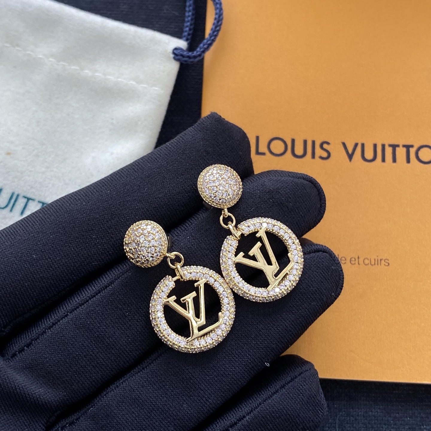 Classic diamond-encrusted round letter earrings