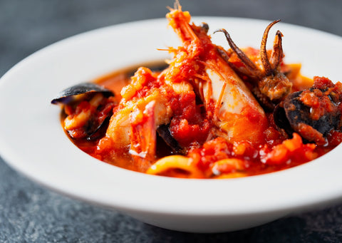 Cioppino with read sauce with mussels, shellfish and seafood