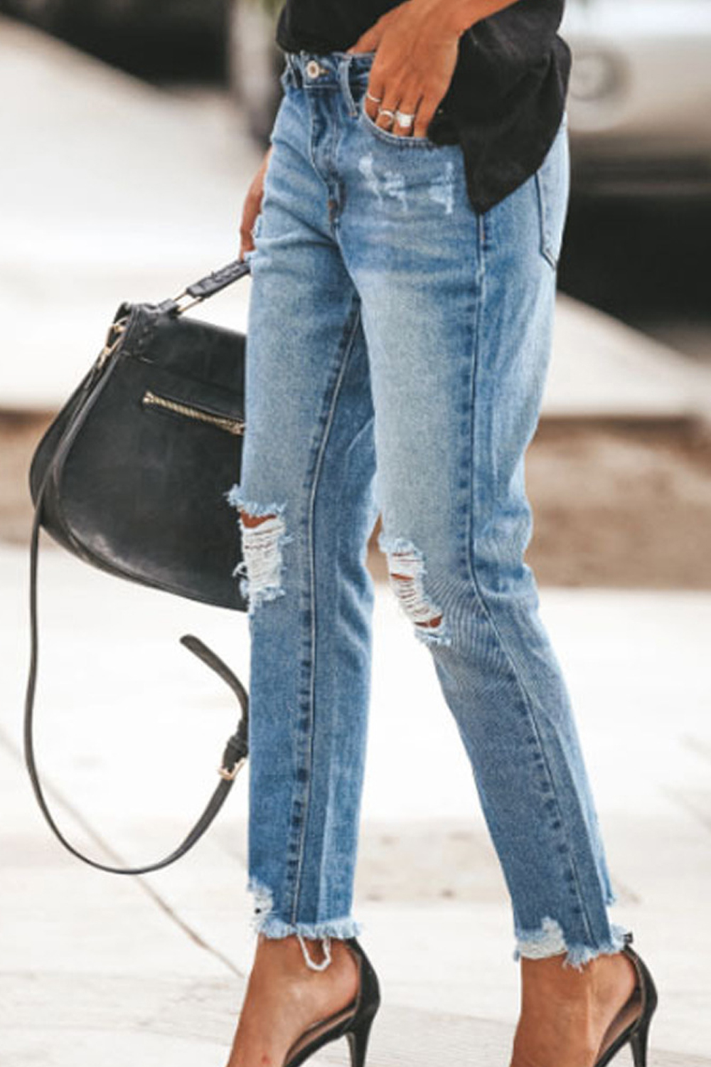 Ripped denim trousers