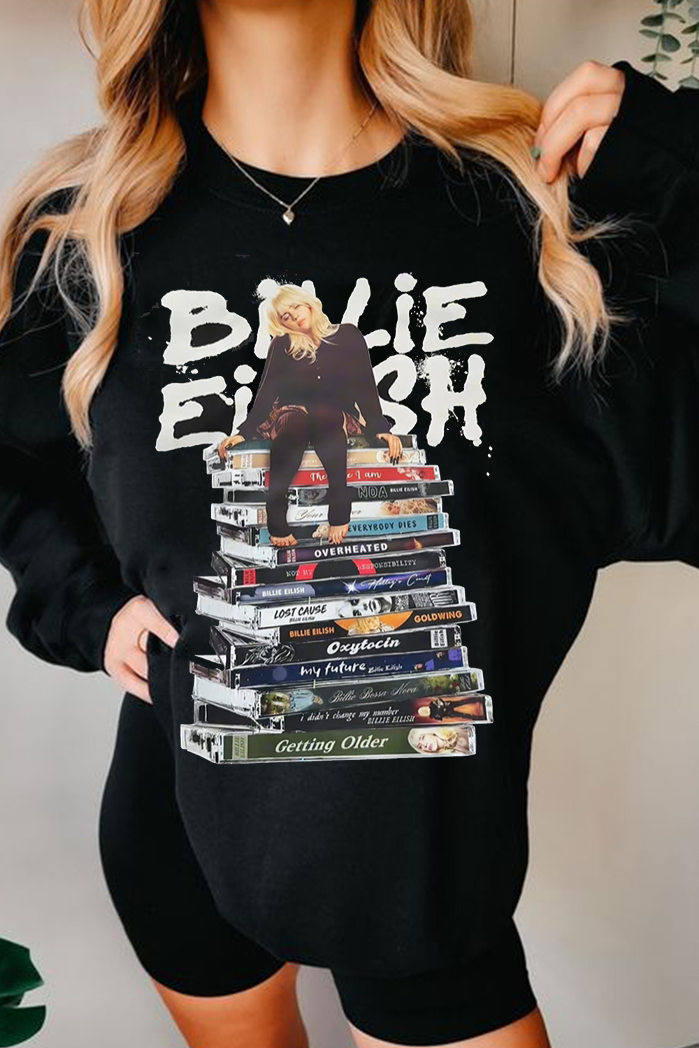 This book contains all Happier Than Ever Album Sweatshirt