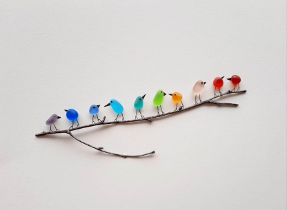 Sea Glass Rainbow Birds - A Symbol of Luck and Style