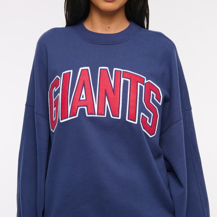 Female fans dark blue football team patch Graphic Oversized Sunday Crew