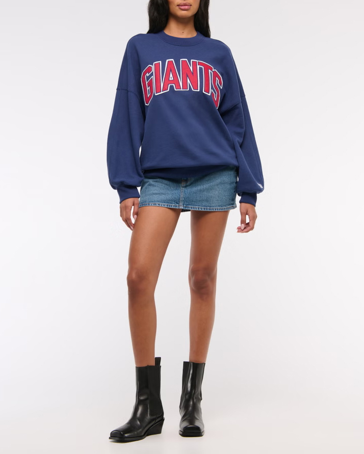 Female fans dark blue football team patch Graphic Oversized Sunday Crew