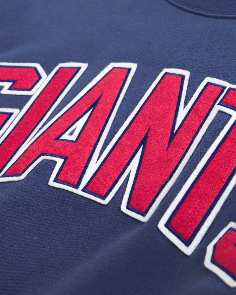 Female fans dark blue football team patch Graphic Oversized Sunday Crew