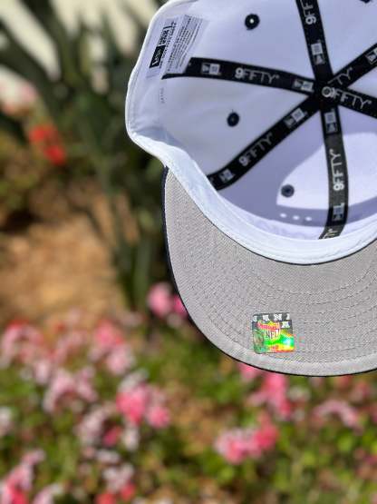 NEW ERA EXCLUSIVE 9FIFTY WHITE/NAVY DALLAS COWBOYS SCRIPT W/ TEAM LOGO SIDE PATCH SNAPBACK