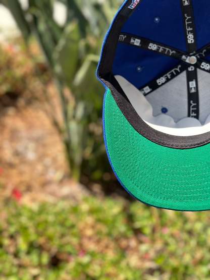 NEW ERA EXCLUSIVE 59FIFTY BLUE LOS ANGELES RAMS W/ NFL LOGO SIDE PATCH