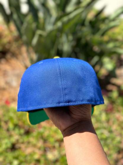 NEW ERA EXCLUSIVE 59FIFTY BLUE/YELLOW LOS ANGELES RAMS SCRIPT W/ NFL LOGO SIDE PATCH