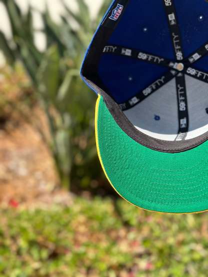 NEW ERA EXCLUSIVE 59FIFTY BLUE/YELLOW LOS ANGELES RAMS SCRIPT W/ NFL LOGO SIDE PATCH