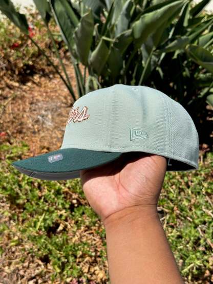 NEW ERA EXCLUSIVE 59FIFTY MINT/EMERALD GREEN LAS VEGAS RAIDERS SCRIPT W/ INAUGRAUL SEASON SIDE PATCH
