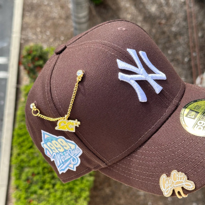 NEW ERA  59FIFTY BROWN/ 1999 WORLD SERIES PATCH
