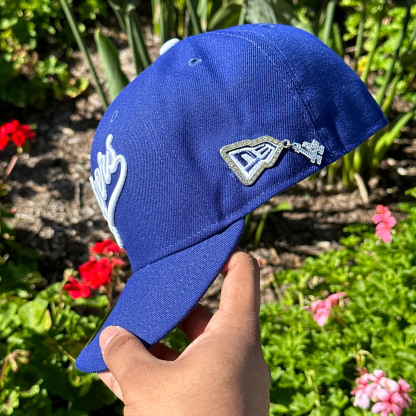 NEW ERA 59FIFTY BLUE  SCRIPT W/ 40TH ANNIVERSARY SIDE PATCH