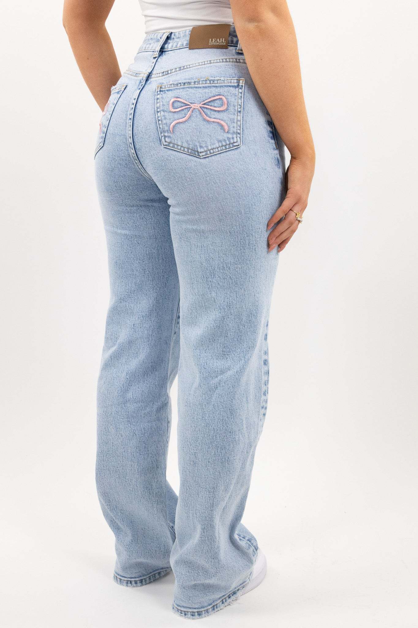 Pink bow jeans