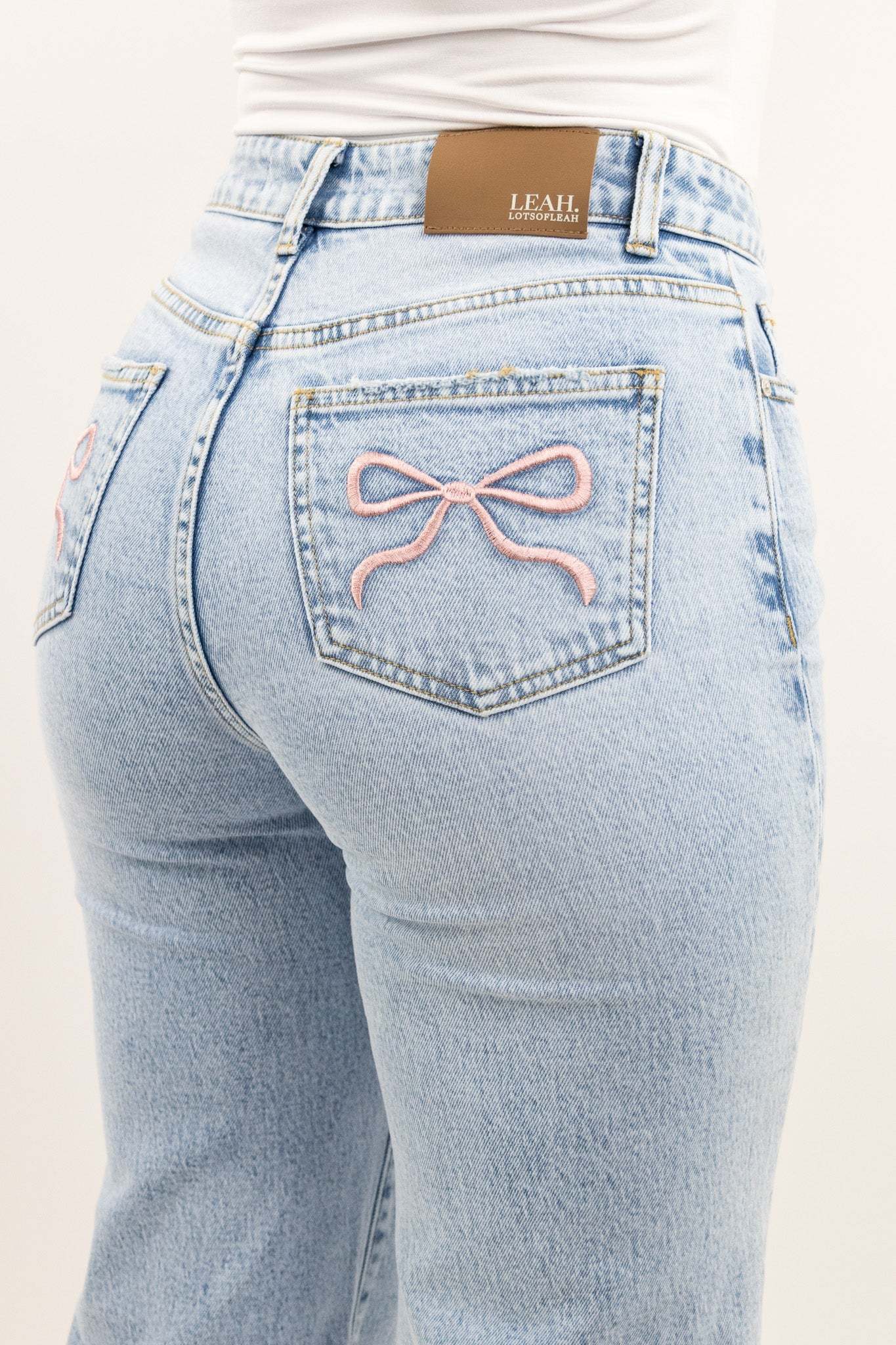 Pink bow jeans
