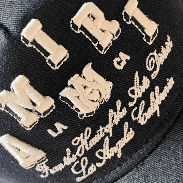 AM EMBROIDERED TRUCKER HAT