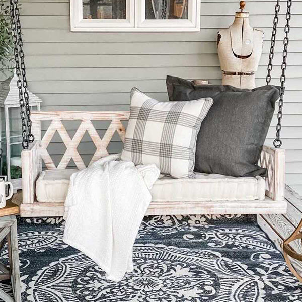 Whitewashed Cushioned Porch Swing