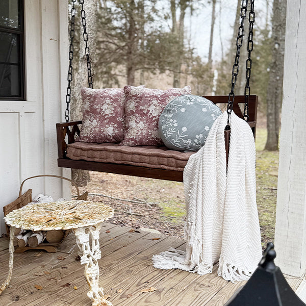 Brown Porch Swing with Cushion