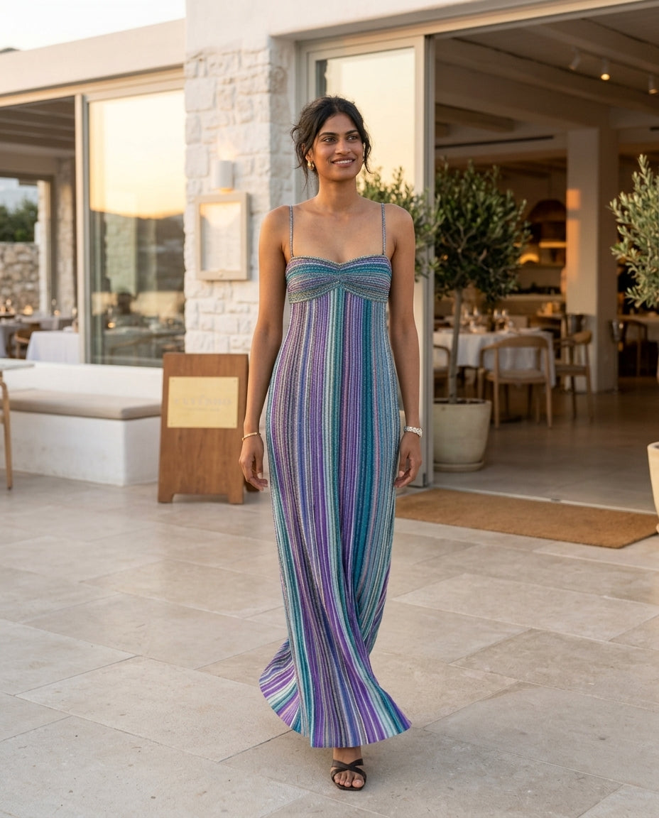 Blue Velvet Wedding Guest Striped Maxi Dress Blue Maxi Dress with Flowing silhouette and Ribbed Knit texture, editorial ecommerce scene for Wedding Guest, a rooftop dinner in LA, Summer current summer selling: vacation, resort dinner, wedding guest, festi by rovole