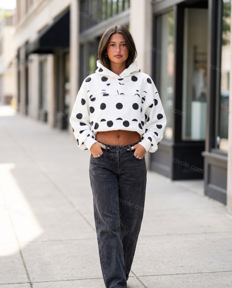 White Polka Dot Knit Top, movement and fit lifestyle view, by rovole.com