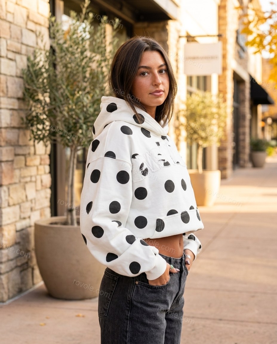 White Polka Dot Knit Top, three-quarter brand lifestyle view, by rovole.com