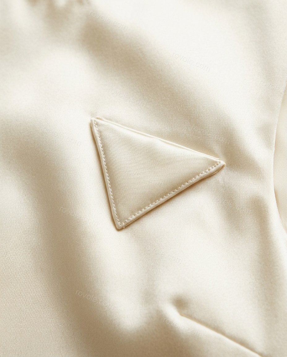 Cream Mini Satin Dress, close-up of deep v-back, large bow detail at back and long trailing streamers from bow, by rovole.com