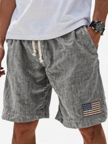 Men's Breathable Linen Embroidered Logo Loose Holiday Shorts
