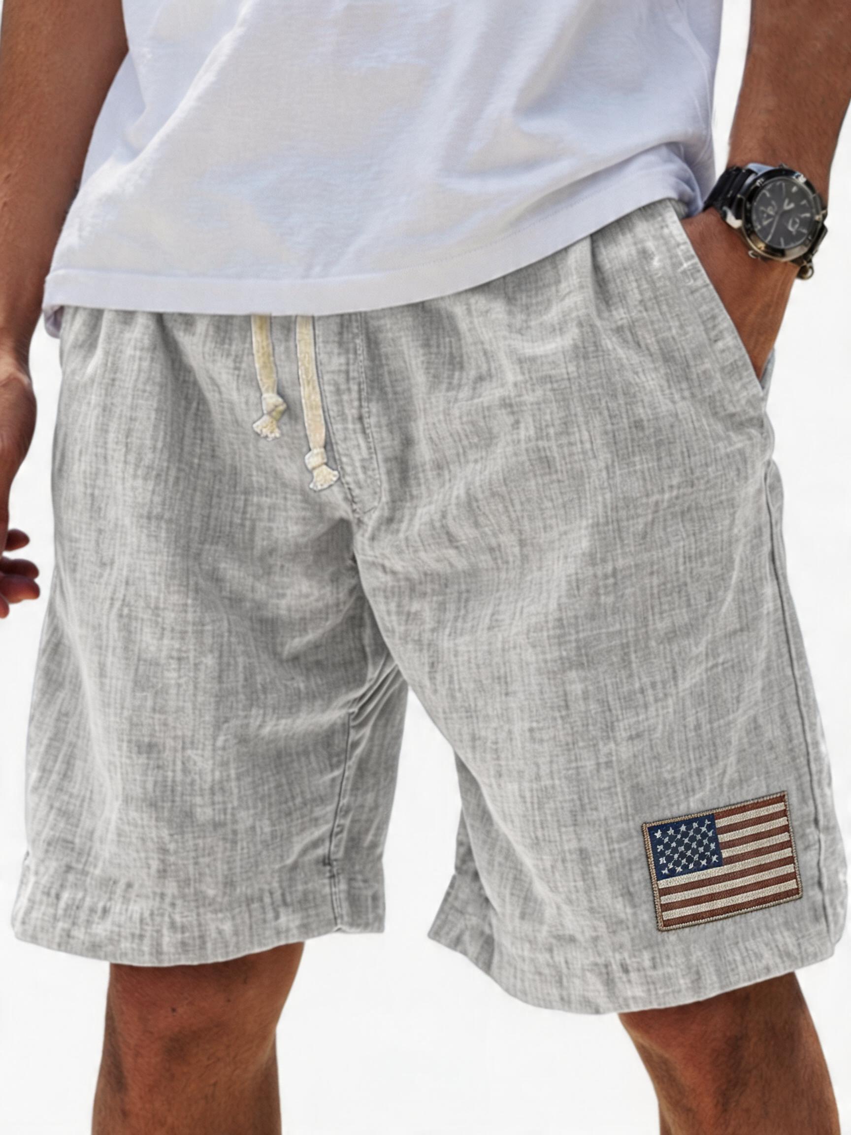Men's Breathable Linen Embroidered Logo Loose Holiday Shorts
