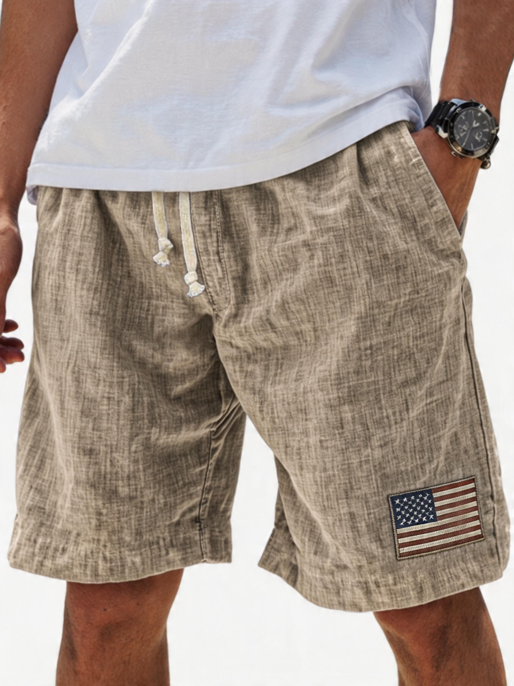 Men's Breathable Linen Embroidered Logo Loose Holiday Shorts