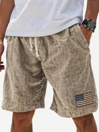 Men's Breathable Linen Embroidered Logo Loose Holiday Shorts