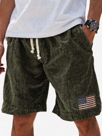 Men's Breathable Linen Embroidered Logo Loose Holiday Shorts