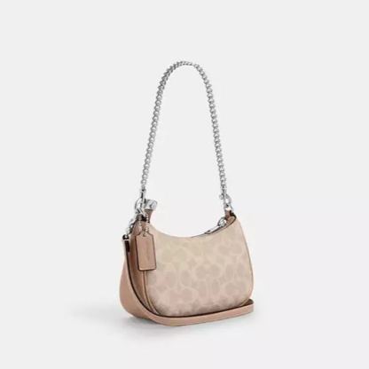 Teri Mini Crossbody Bag In Signature Canvas