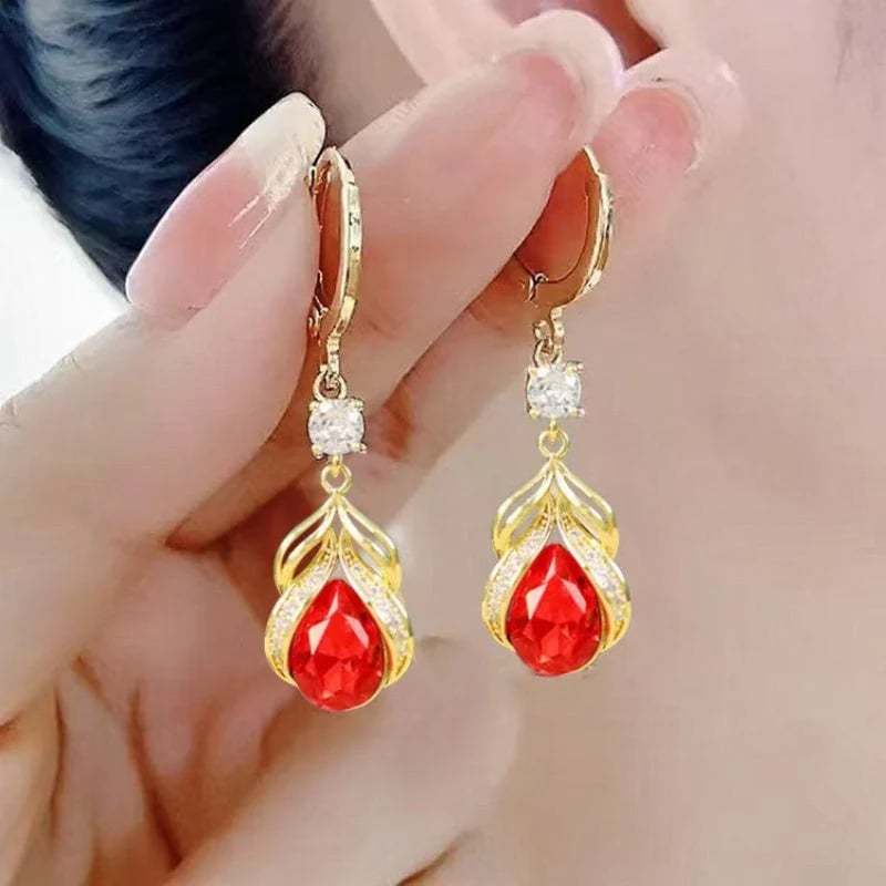 💧Fashionable women's earrings with a teardrop pendant