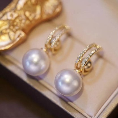 Pearl earrings (various wearing styles)