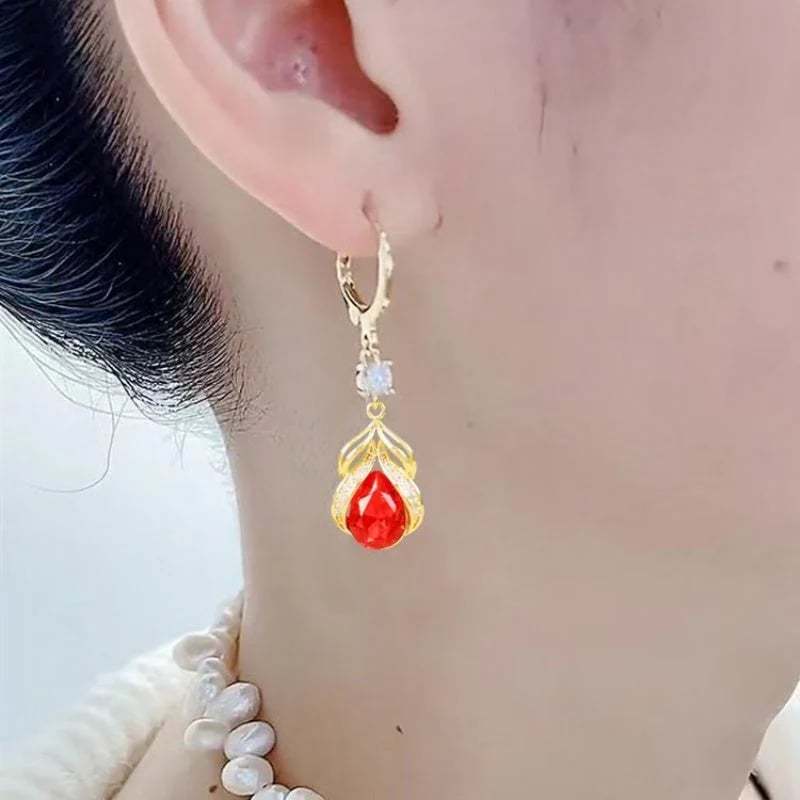 💧Fashionable women's earrings with a teardrop pendant