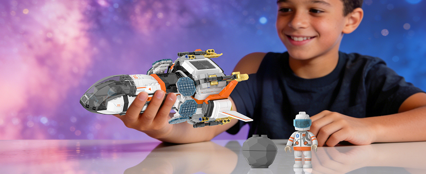 Modular spaceship building set with 944 pieces, astronaut minifigures, and space exploration scene