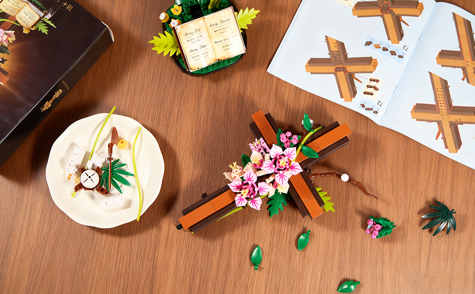 Adult assembling the 568-piece Jesus cross flower building set