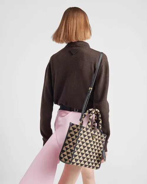 PP Small Symbole embroidered fabric handbag