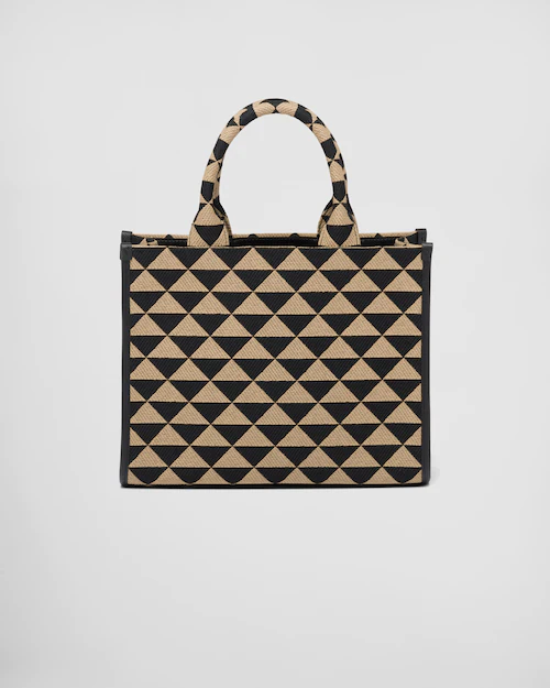 PP Small Symbole embroidered fabric handbag