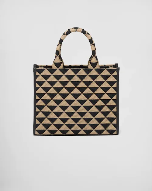 PP Small Symbole embroidered fabric handbag