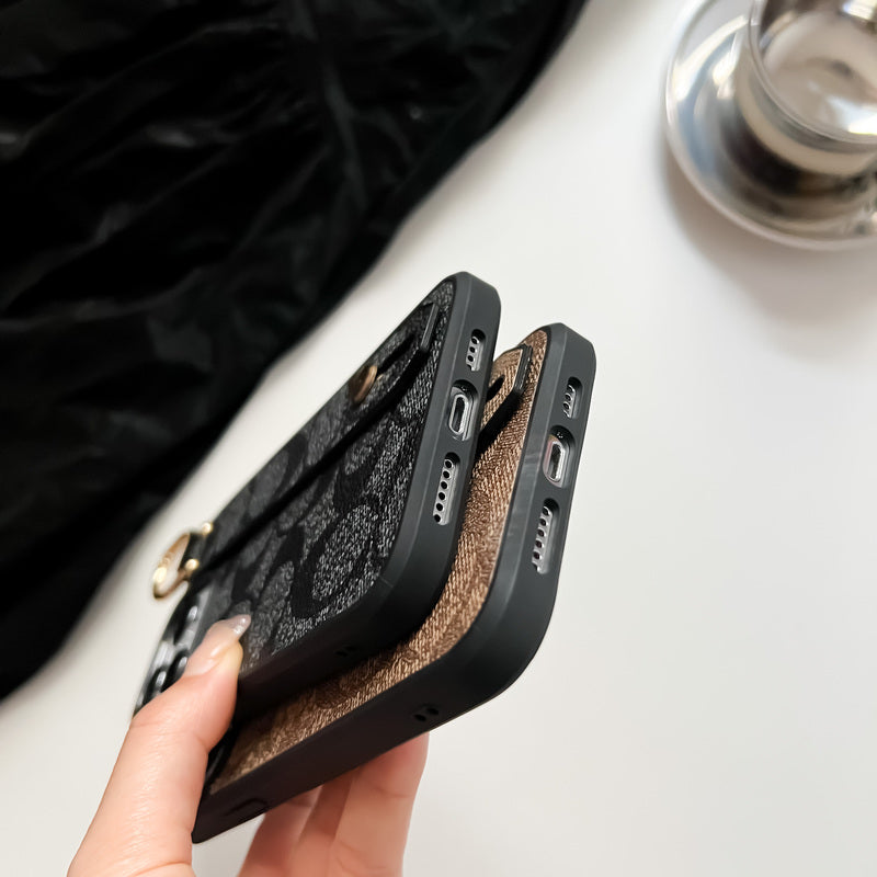 coach-iphone-case-with-holder-black-sw240330-7563