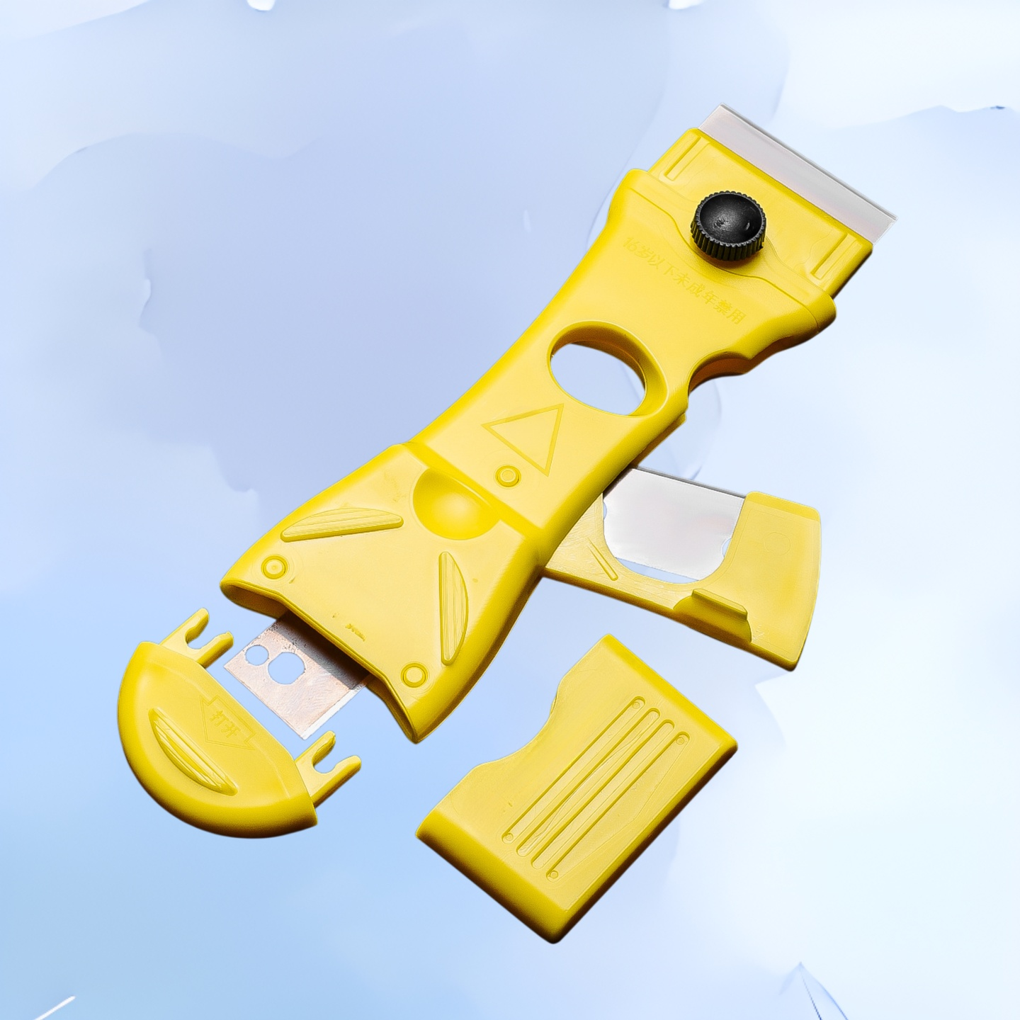 Špachtle na odstranění lepidla, praktické a ostré, bezpečné používání