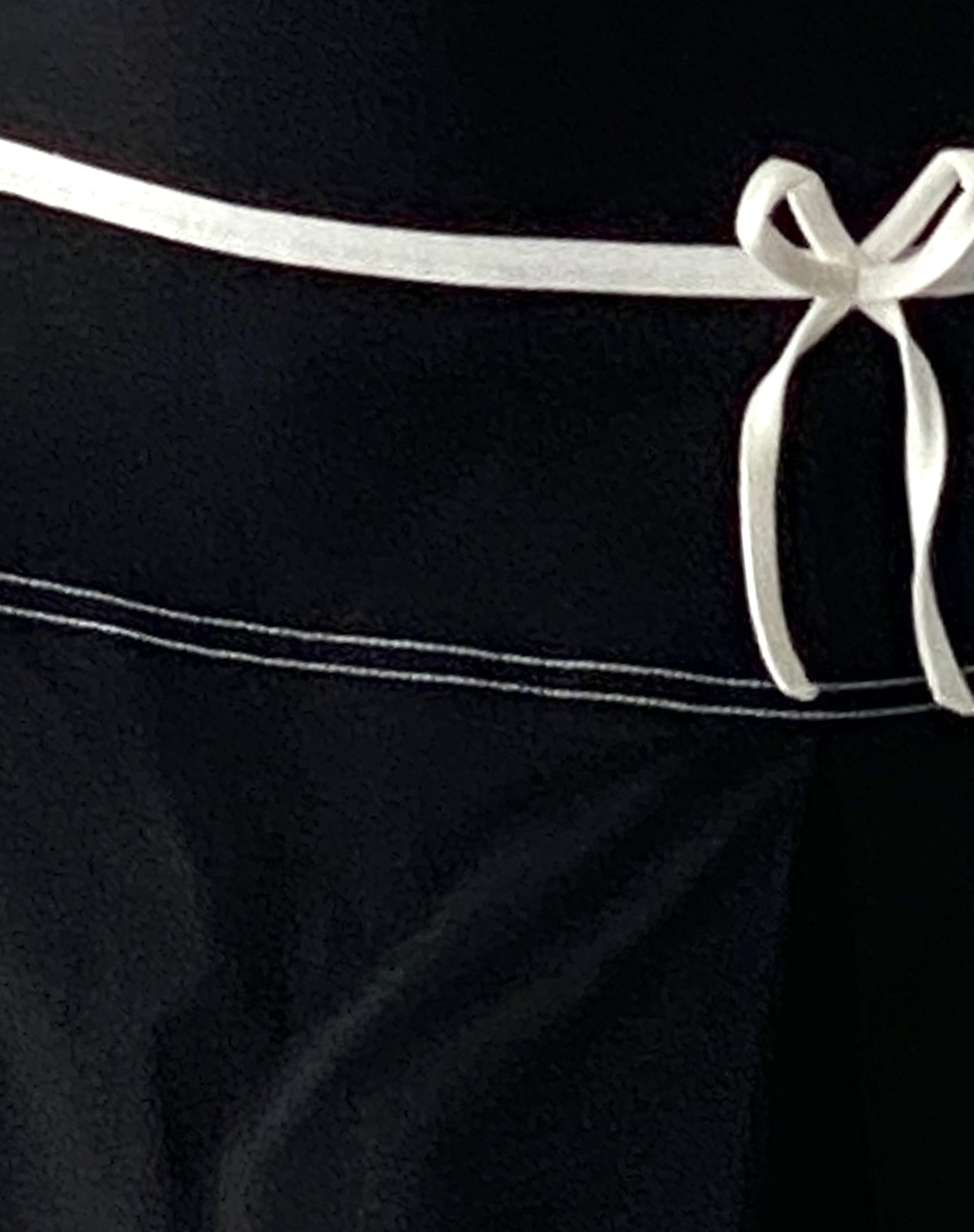 Istari Bow Detail Mini Skirt in Black with White Binding-Nico Sky