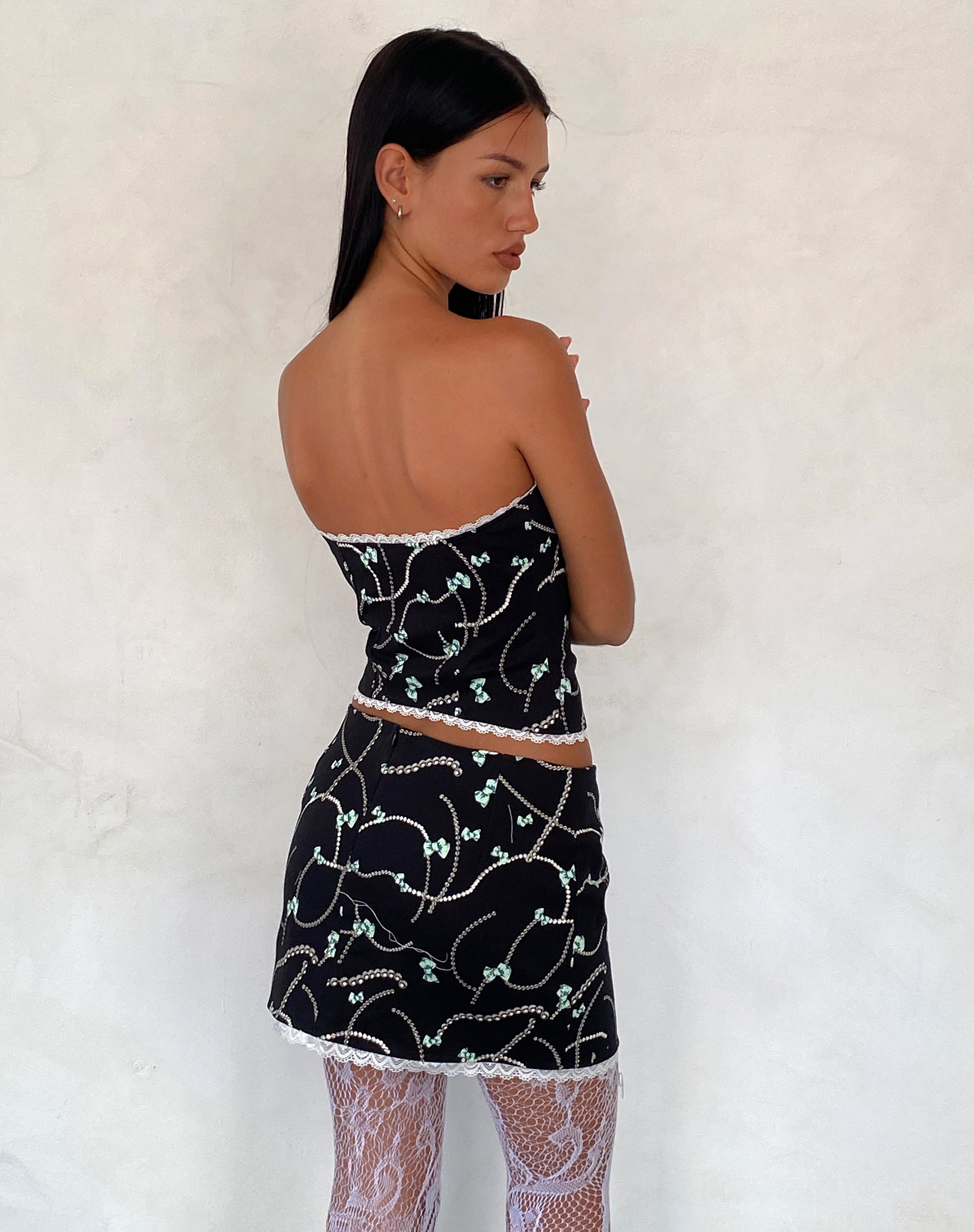 Molen Mini Skirt in Black with Pearl and Bow Print-Nico Sky