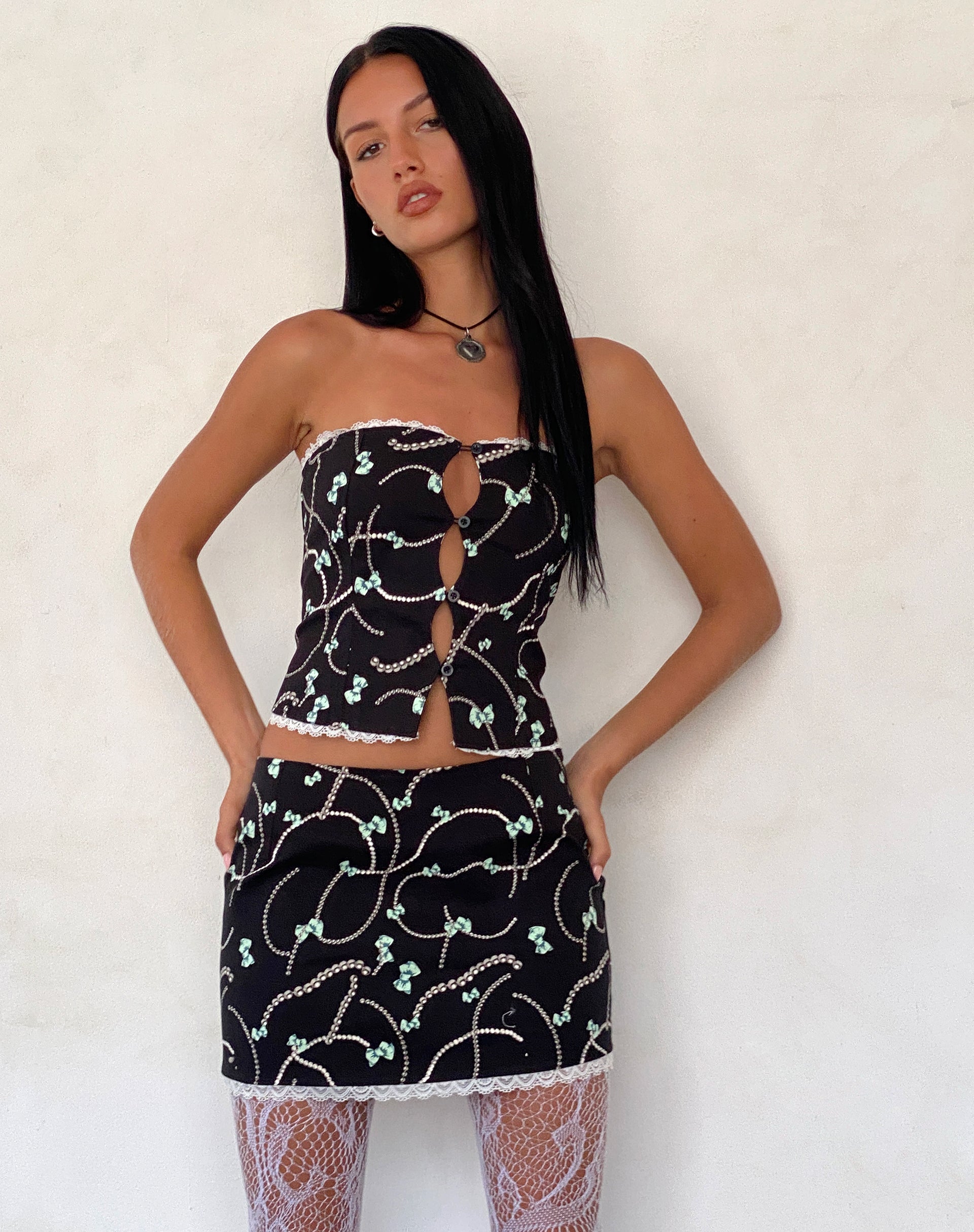 Molen Mini Skirt in Black with Pearl and Bow Print-Nico Sky