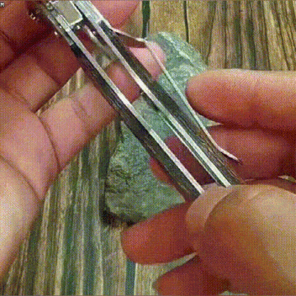 Multifunctional folding tool with wooden handle for self-defense